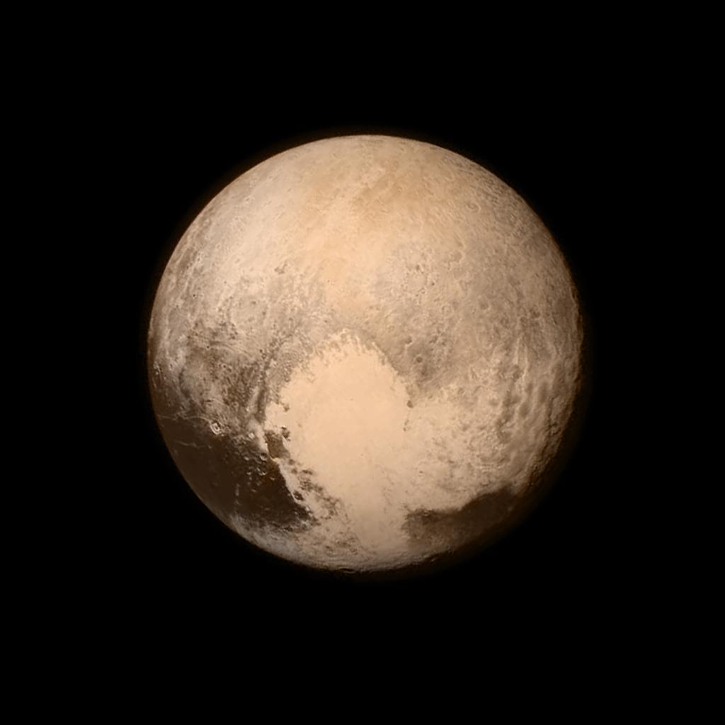 Real NASA New Horizons photo of Pluto, Scorpio's modern ruling planet, showing its famous heart-shaped region